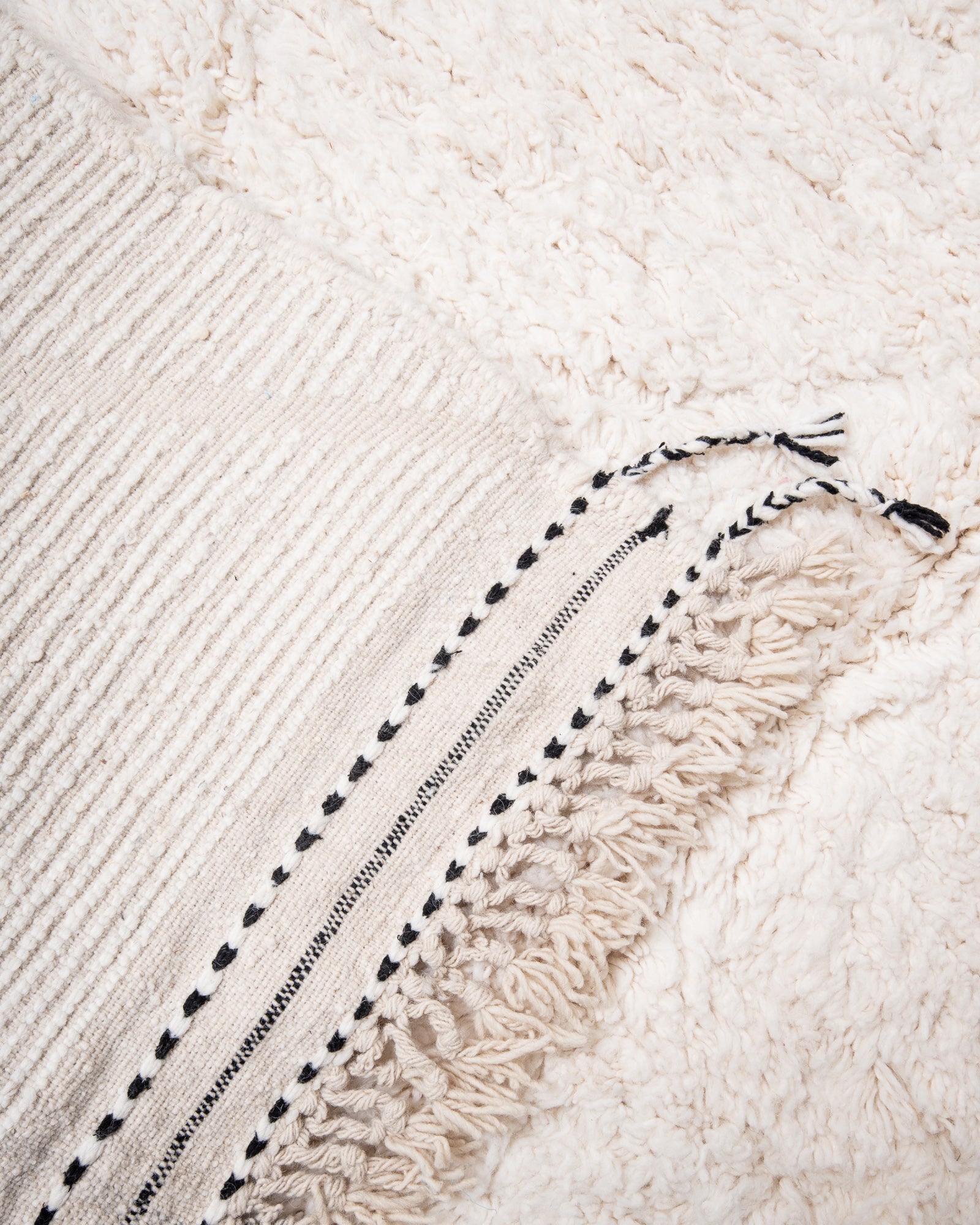 Modern, designer, handcrafted Berber rug from Morocco. Beniourain carpet with beautiful colours and patterns and fluffy wool texture.
